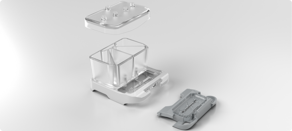 Exploded view of the Pod Portable Module, showing the media reservoirs, lid, and chip carrier.